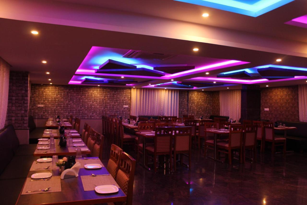 Golden Pride Hotel Kanakapura Exterior photo