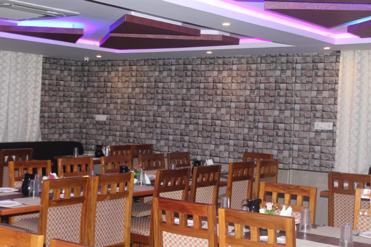 Golden Pride Hotel Kanakapura Exterior photo